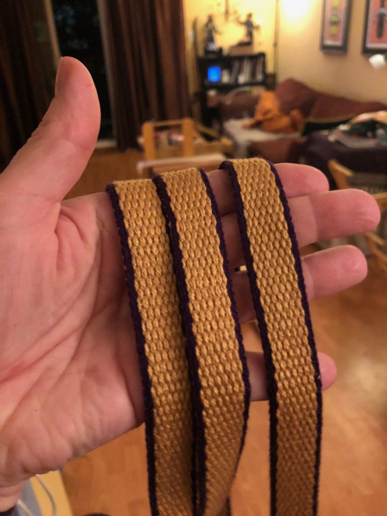 Purple and gold belt