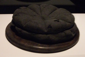 Carbonized bread found in a oven in Pompeii